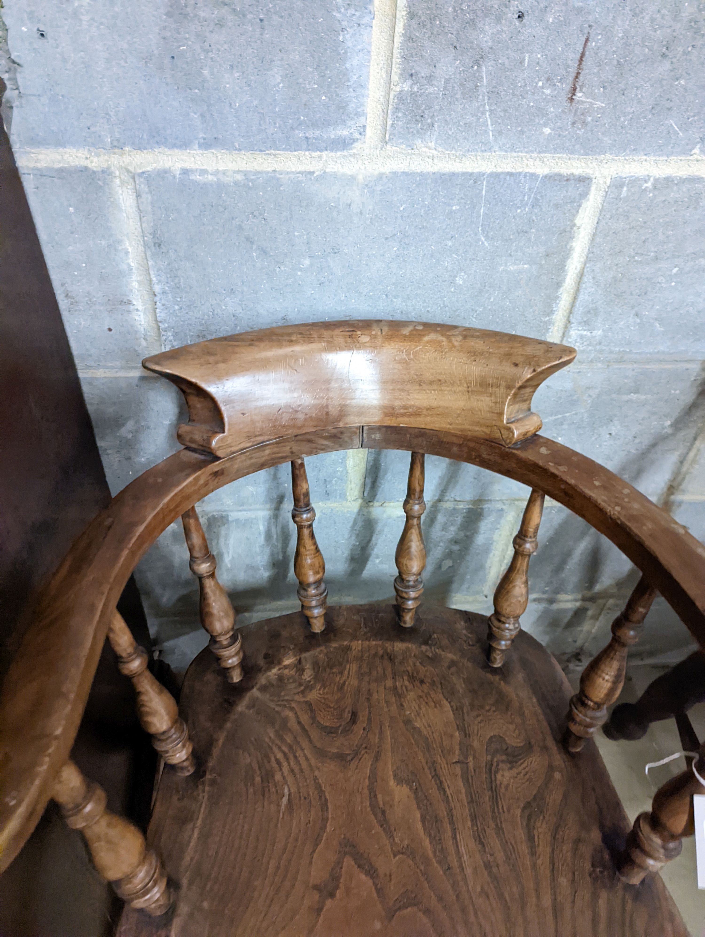A near pair of Victorian beech and elm smoker's bows. H-77cm.